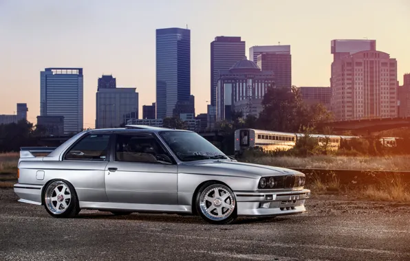 Picture BMW, silver, BMW, the car, skyscrapers, megapolis, Coupe, front, E30, silvery, 3 Series, profile