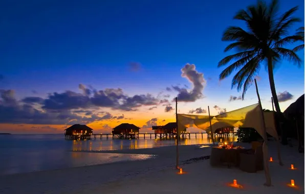 Picture beach, sunset, the ocean, the evening, candles, the hotel