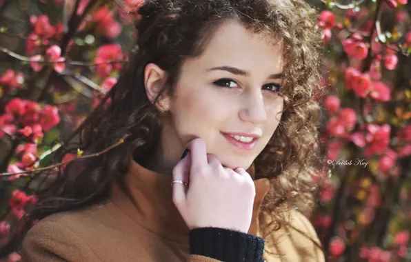 Picture look, girl, flowers, branches, spring, ring, curls, brown hair, brown-eyed