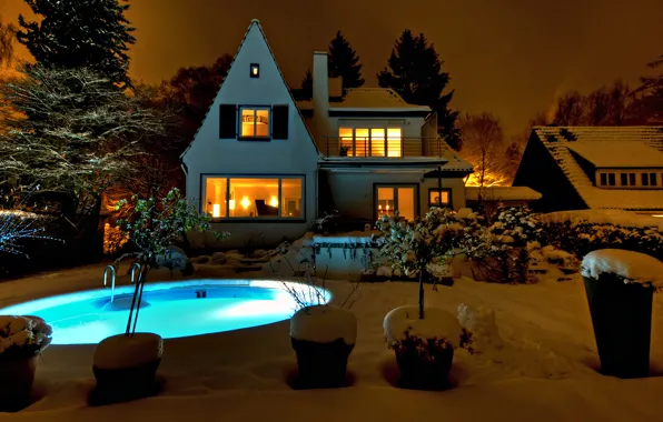 Picture winter, pool, the light in the Windows, winter evening