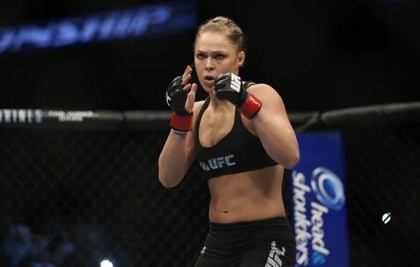 Picture the champion of UFC, Ronda Rousey, The Armbar Assassin, Rhonda Jean Rouse, Rowdy, MMA fighter