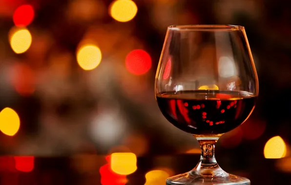 Picture glass, bokeh, cognac, alcohol