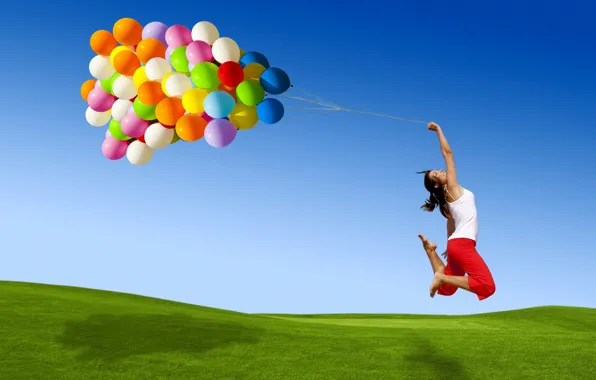 Picture the sky, grass, color, girl, balls, flight, joy, smile, jump, balls, colorful, a lot