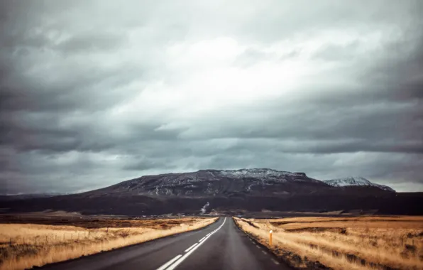 Picture road, field, mountains, gray clouds