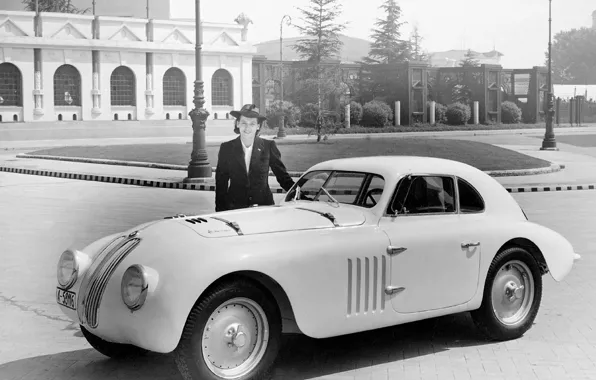 Picture woman, black and white photo, beginning, 328 Mille Miglia Touring Coupe