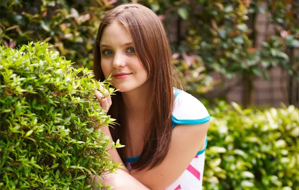 Picture look, girl, smile, garden, brown hair, the bushes, Emily, amelie, gray-eyed